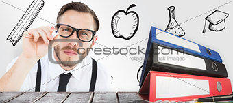 Composite image of geeky businessman writing with marker