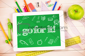 Go for it! against students desk with tablet pc
