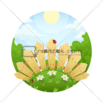 Wooden fence on lawn with flower