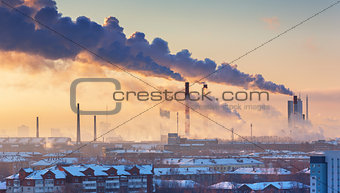 chimneys with smoke in the city