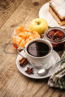Breakfast with coffee and fruits
