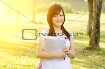 Young Asian college girl student 