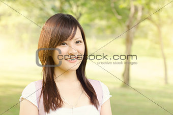Asian college girl student smiling