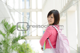 Asian college girl student at school campus