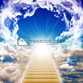 Stairway leading up to bright light