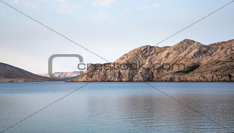 Sea lagoon enclosed by mountains