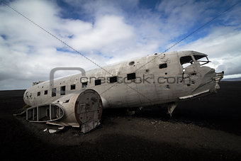 Airplane wreck on a black beach in south of Iceland