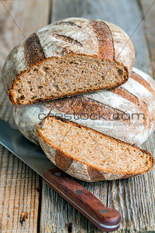 Fresh homemade bread and knife.