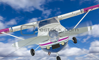Front of Cessna 172 Single Propeller Airplane In The Sky