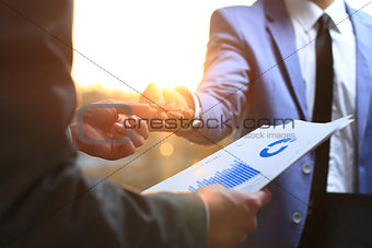 businessman giving a pen. signing of a contract