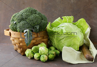 different kinds of cabbage - broccoli, Brussels sprouts and white cabbage