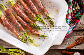 Prosciutto wrapped green asparagus