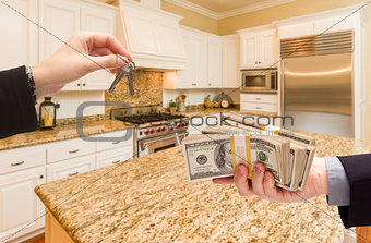 Handing Over Cash for Keys Inside Beautiful Kitchen