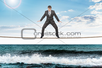 Businessman on rope