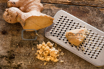Fresh ginger root and grater