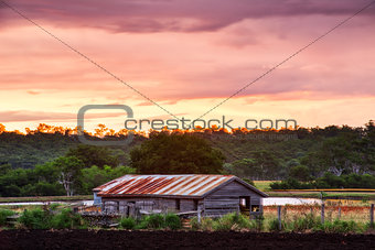 Abandoned farming shed in the country