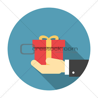 Gift box in hand flat icon