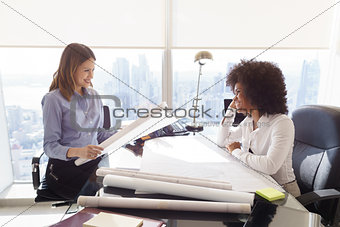 Multiethnic Team Architect Women With Plans And Project