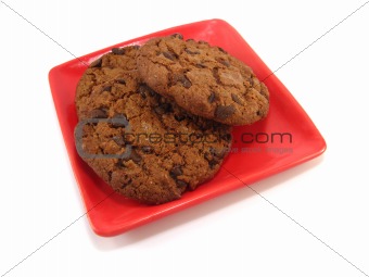 chocolate cookies on a red plate