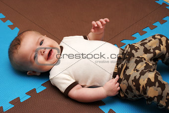 Infant Boy On Play Mat