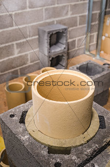 Construction of modular ceramic chimney in the house