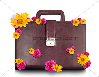 Brown suitcase with flowers