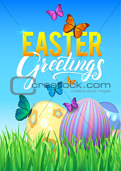 Easter eggs in Fresh Green Grass. Decorated Easter Eggs in Grass on Sky Background. Happy Easter Calligraphy Poster Template