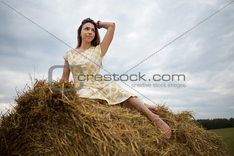 barefoot girl in the hayloft