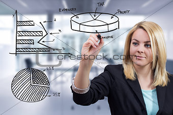 Business woman drawing three charts at office