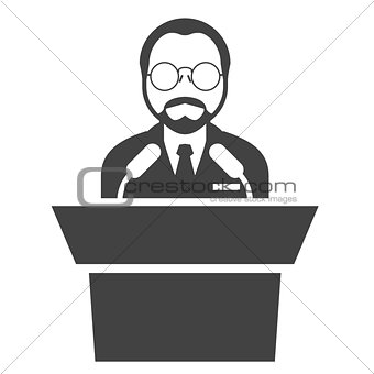 Speaker at rostrum - man in glasses at tribune, presentation