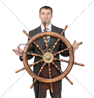 Businessman with steering wheel