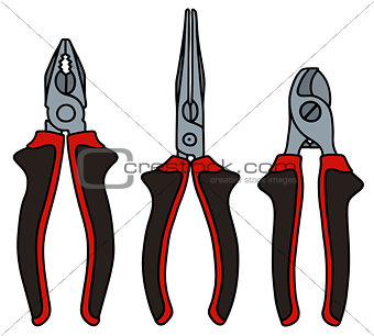 Set of red and black pliers