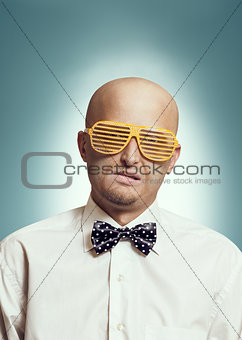 Bald man in fashion glasses