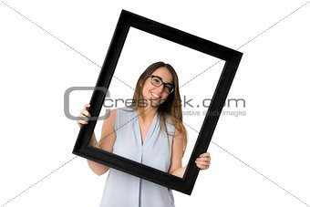 Woman with glasses inside black frame