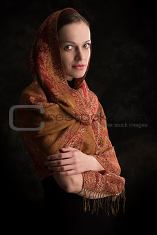 beautiful girl enveloped in headscarf
