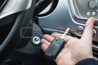 Car key on a palm