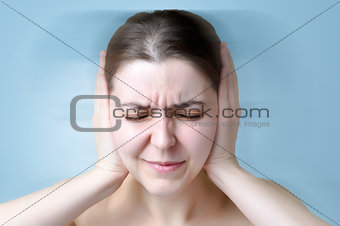 Woman suffering from noise