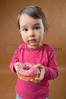 Little girl with  donut