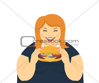 Happy fat woman eating a big hamburger