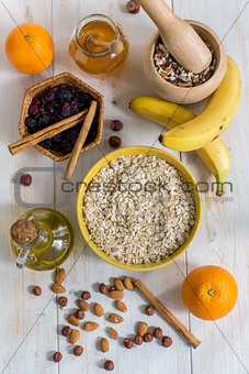 Rolled oats, honey and other ingredients for a healthy breakfast