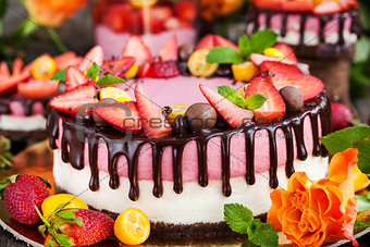 Delicious double cheesecake decorated with chocolate and fresh s