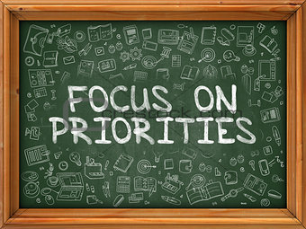 Focus on Priorities - Green Chalkboard.