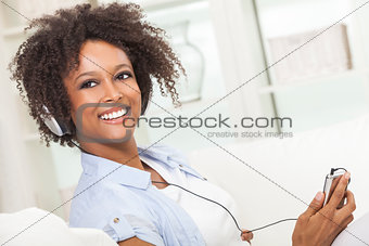 African American Girl Listening to MP3 Player Headphones