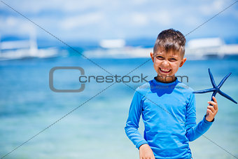 Boy with starfish
