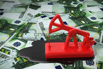 Red Pumpjack And Spilled Oil On Euros