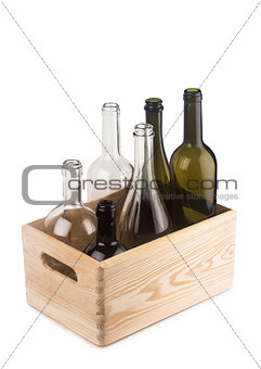 Crate with different wine bottles