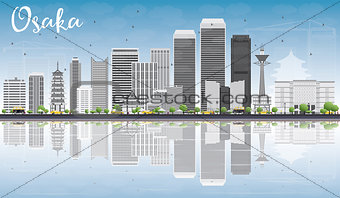 Osaka Skyline with Gray Buildings, Blue Sky and Reflections. 