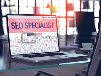 Laptop Screen with SEO Specialist Concept.