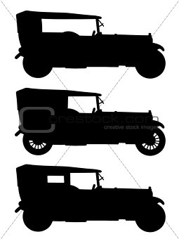 Black silhouettes of vintage cars