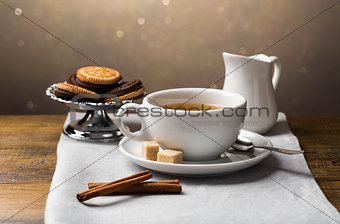 Set of tea cups with saucer and milk jug